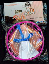 #TY174  - Hard Plastic Doll Baby in a Basket Toy