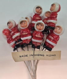 #HH265- One Dozen Hand Painted Hard Plastic Mini Eskimos on a Wire