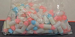 #TY986 - Unopened Bag of 144 Miniature Toy Baby Bottles