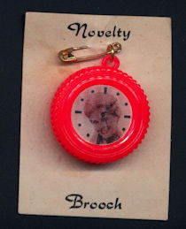 #CH387 -  Doris Day/Clock Flicker Brooch on Display Card