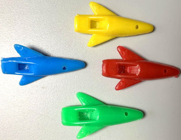 #TY886 - Group of 4 Different Colored Rocket Whistles