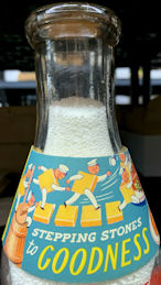 #DA104 - Rare Milk Bottle Collar Featuring Milkmen and a Butter Churn