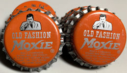 #BC124 - Group of 10 Moxie Bottle Caps Picturing the Moxie Man