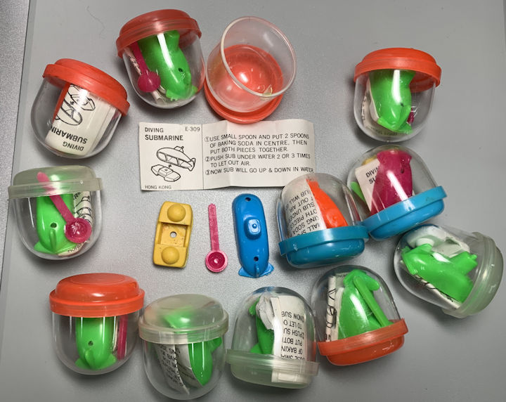Group of 12 Baking Soda Powered Diving Submarine Gumball Toys in Capsules