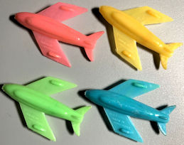 #TY880 - Group of 4 Different Colored Toy Airplane Whistles