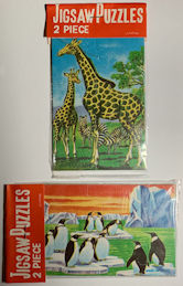 #TY847 - Group of 3 Made in Japan Puzzle Packages with Two Puzzles in Each - Giraffe and Penguin Puzzles