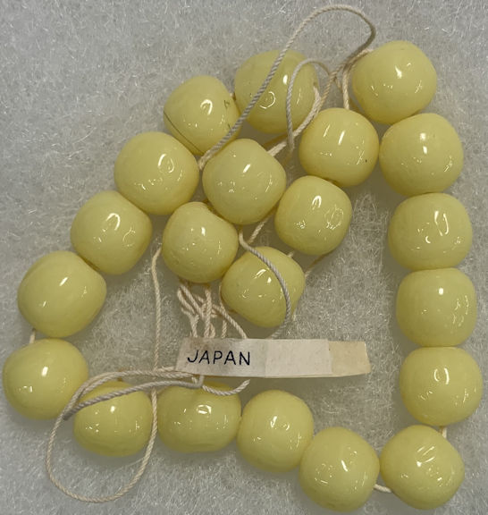 #BEADS0963 - Strand of 24 Cherry Brand Glass 12mm Light Yellow Baroque (Dimpled) Glass Beads