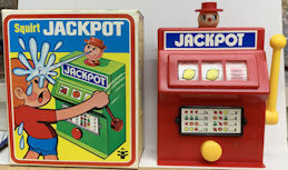 #TY792 - Squirt Jackpot - Slot Machine Squirt Gag in Illustrated Box