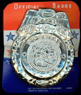 #TY198  - Carded Tin Toy Special Police Badge -...