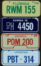 #TY165 - Group of 7 Post Honeycomb Toy Bike License Plates