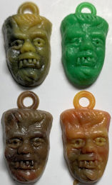 #CH161  - Group of 4 Monster Head Vampire Charms